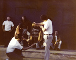 Brown Image Car Club: Photograph of the symbolic ritual of burning a jacket in front of club members