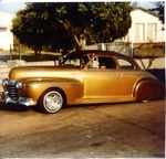 City Car Club: Photograph of a 1941 Oldsmobile on Highland Avenue