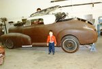 Classics Car Club: Photograph of Ernie Carrillo in Eck's shop with 1948 Chevy
