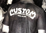Custom Car Club: Photograph of a Custom Car Club jacket, taken at a dance