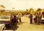Korner Car Club: Photograph of Korner Car Club members outside of Our Lady Guadalupe Church during the annual blessing of the cars by Father Brown