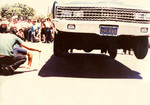 Korner Car Club: Photograph of a Korner Car Club lowrider "hopping" at the county administration building in downtown San Diego