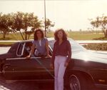Ladies Pride Car Club: Photograph of Monica Camacho and Sandy original Ladies Pride members in front of Monica’s 1978 Green Cutlass Supreme at J Street Marina in Chula Vista, CA