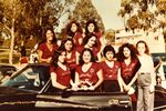 Ladies Pride Car Club: Photograph of Monica Camacho and original club members posing in front of Elsa’s black Monte Carlo, Location unknown somewhere in San Diego