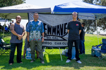 New Wave Car Club: Photograph of New Wave Car Club members with banner at Lowrider Council event at Mission Bay
