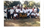 Oldies Car Club: Photograph of car club members with banner